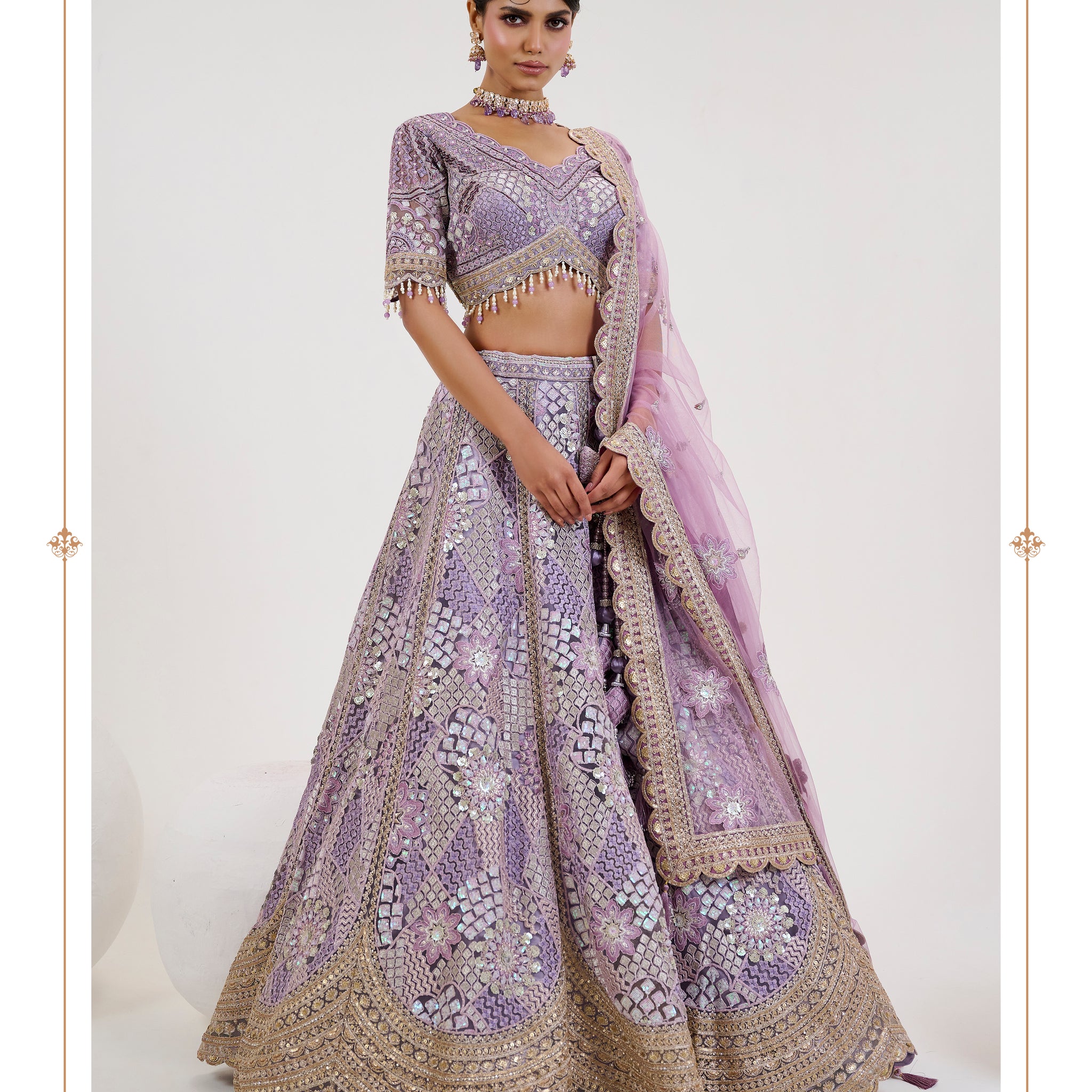 Lavender Bridal Lehenga with Gold Embroidery and Net Dupatta