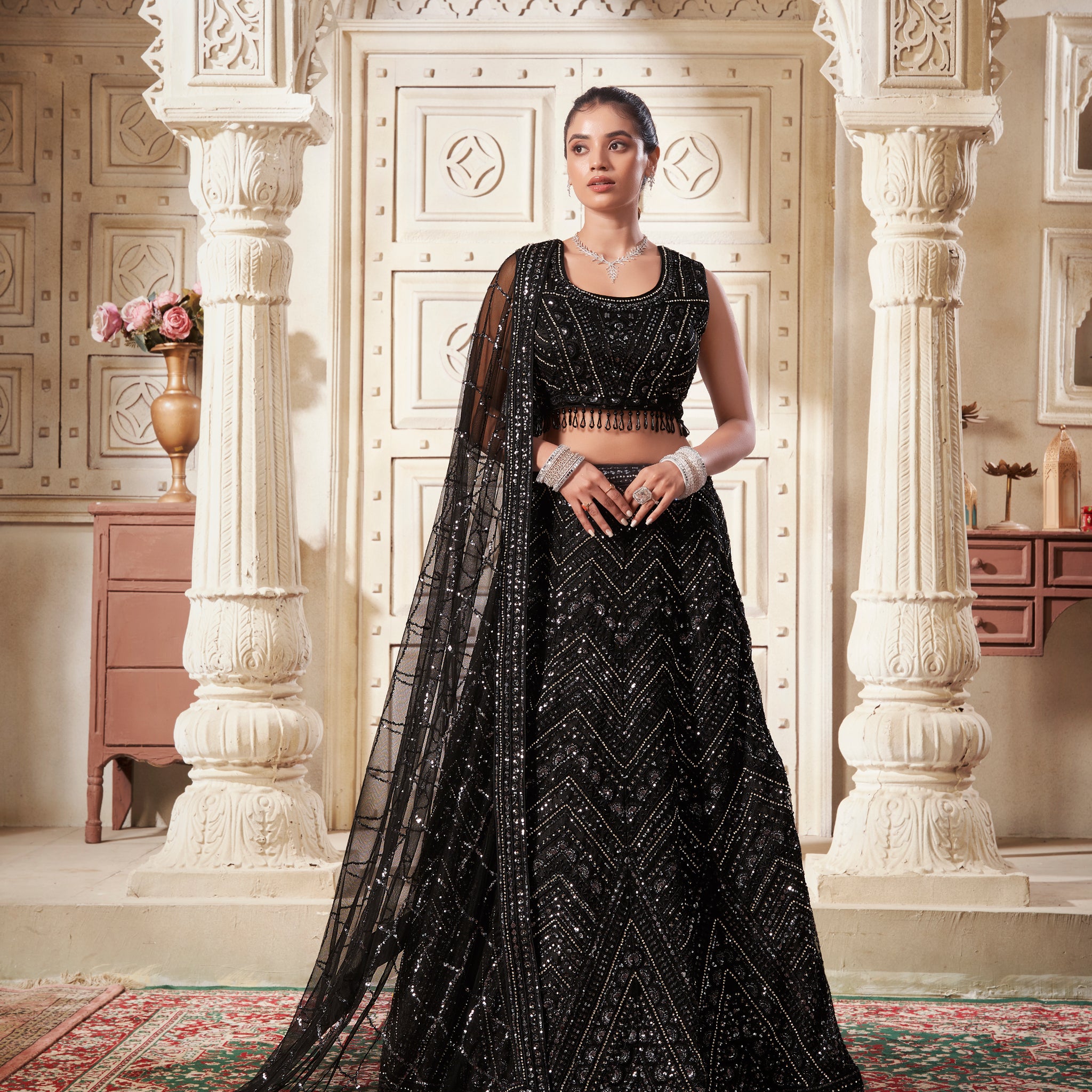 Blossom Black Net Lehenga Choli with Heavy Zarkan and Sequins Work