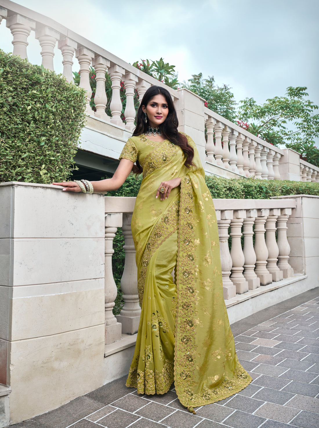 Olive Green Pure Tissue Silk Saree with Zari and Pearl Embellishments