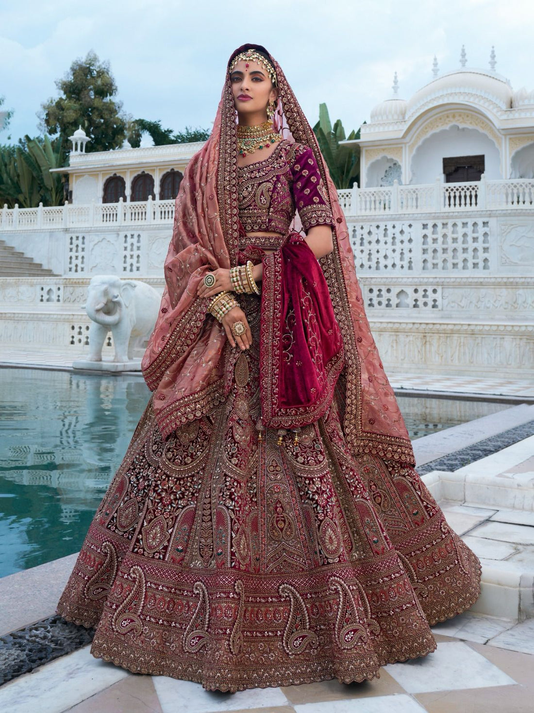 Maroon bridal lehenga choli with intricate embroidery

