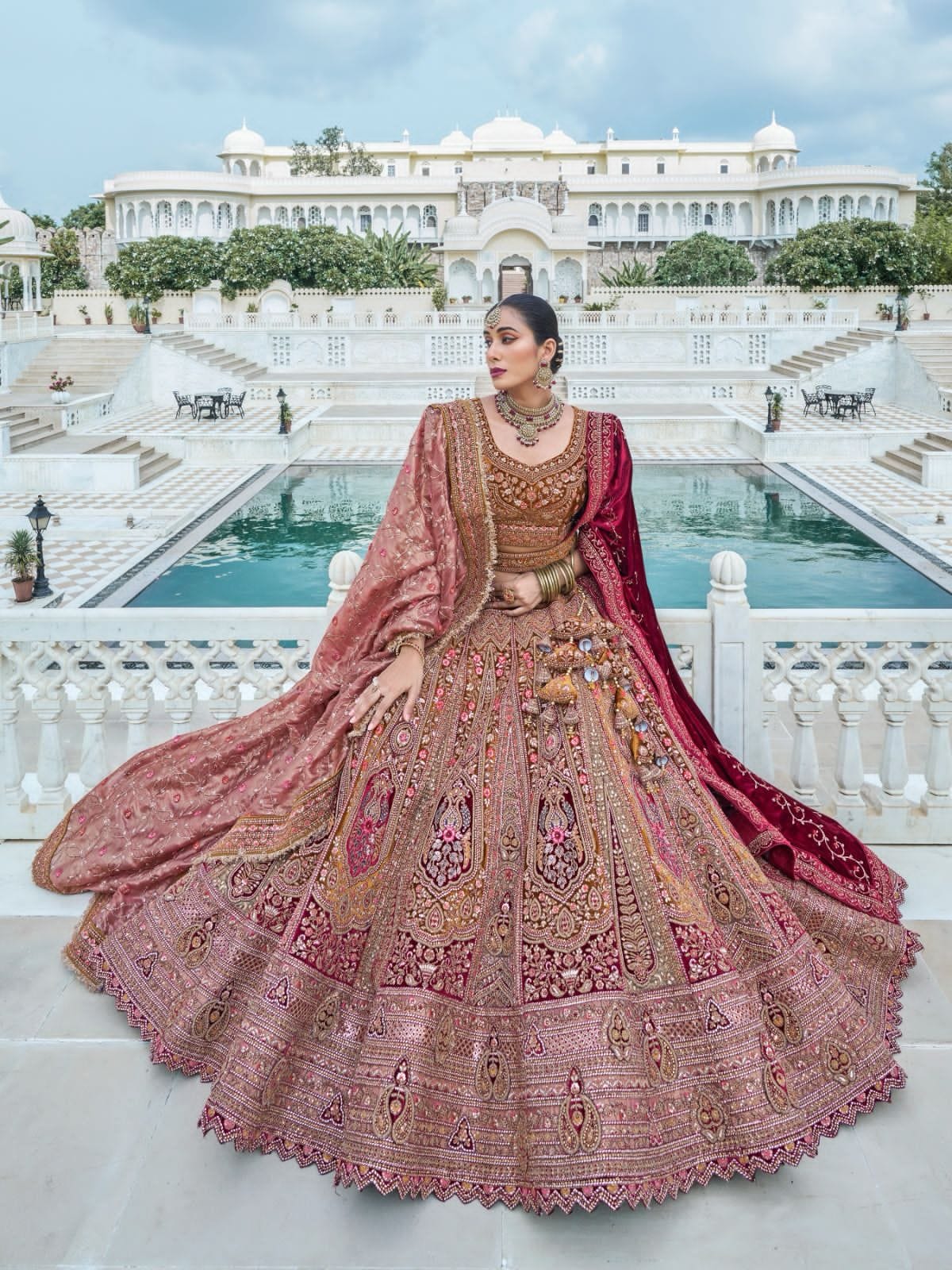 Pink and Maroon Bridal Lehenga with Handcrafted Embroidery