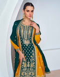 Woman in Mustard Yellow and Dark Green Embroidered Palazzo Suit.