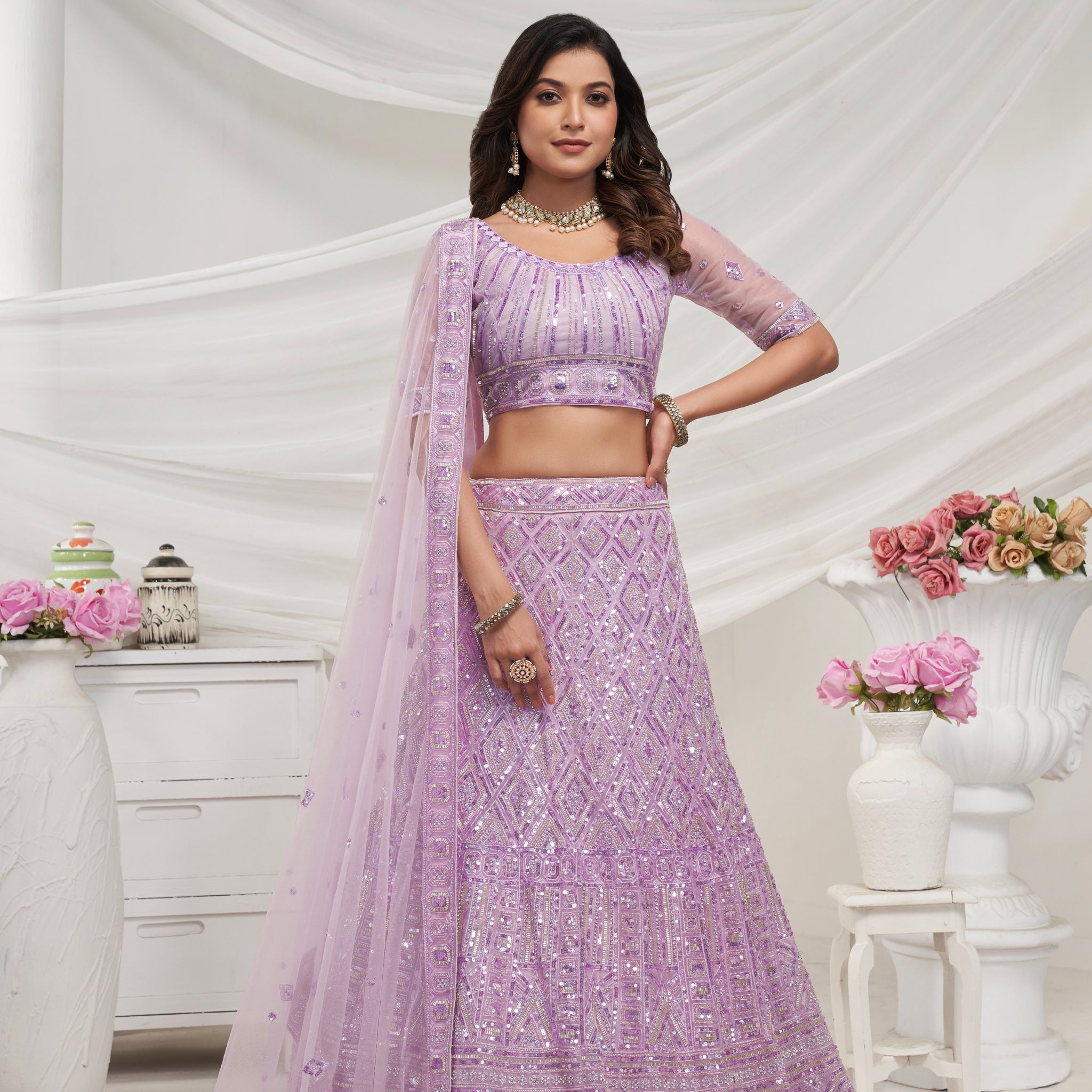 Elegant Mauve Soft Net Lehenga Choli with Pearl & Diamond Sequin Work