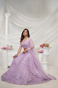 Elegant Mauve Soft Net Lehenga Choli with Pearl & Diamond Sequin Work