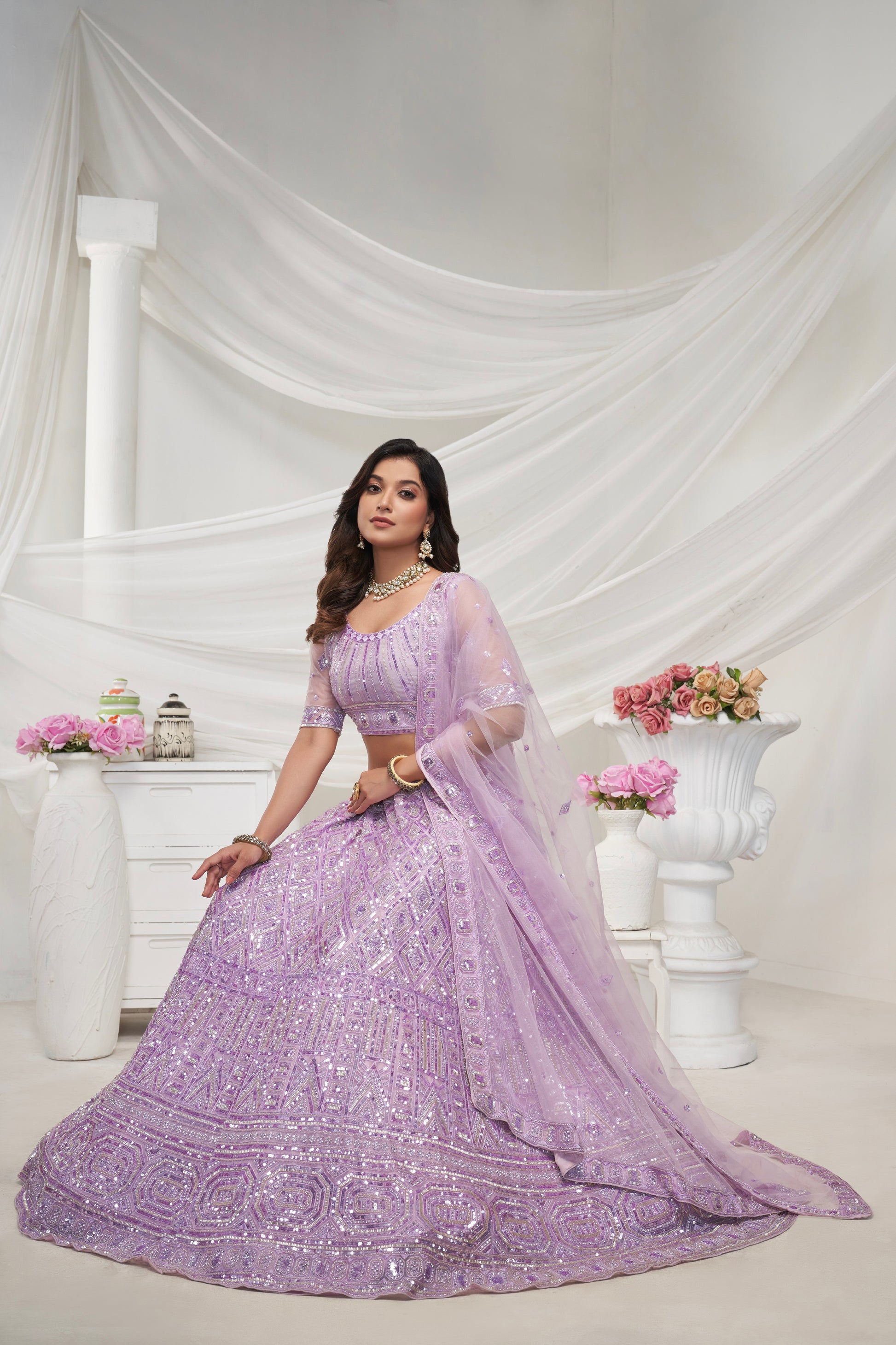 Elegant Mauve Soft Net Lehenga Choli with Pearl & Diamond Sequin Work