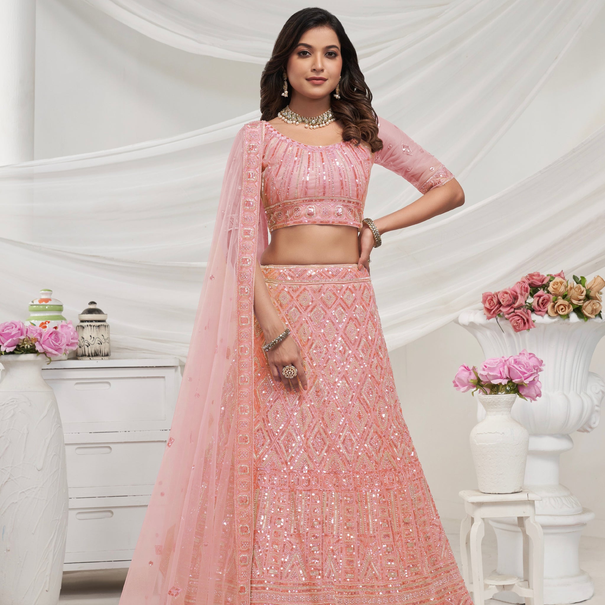 Elegant Peach Soft Net Lehenga Choli with Pearl & Diamond Sequin Work