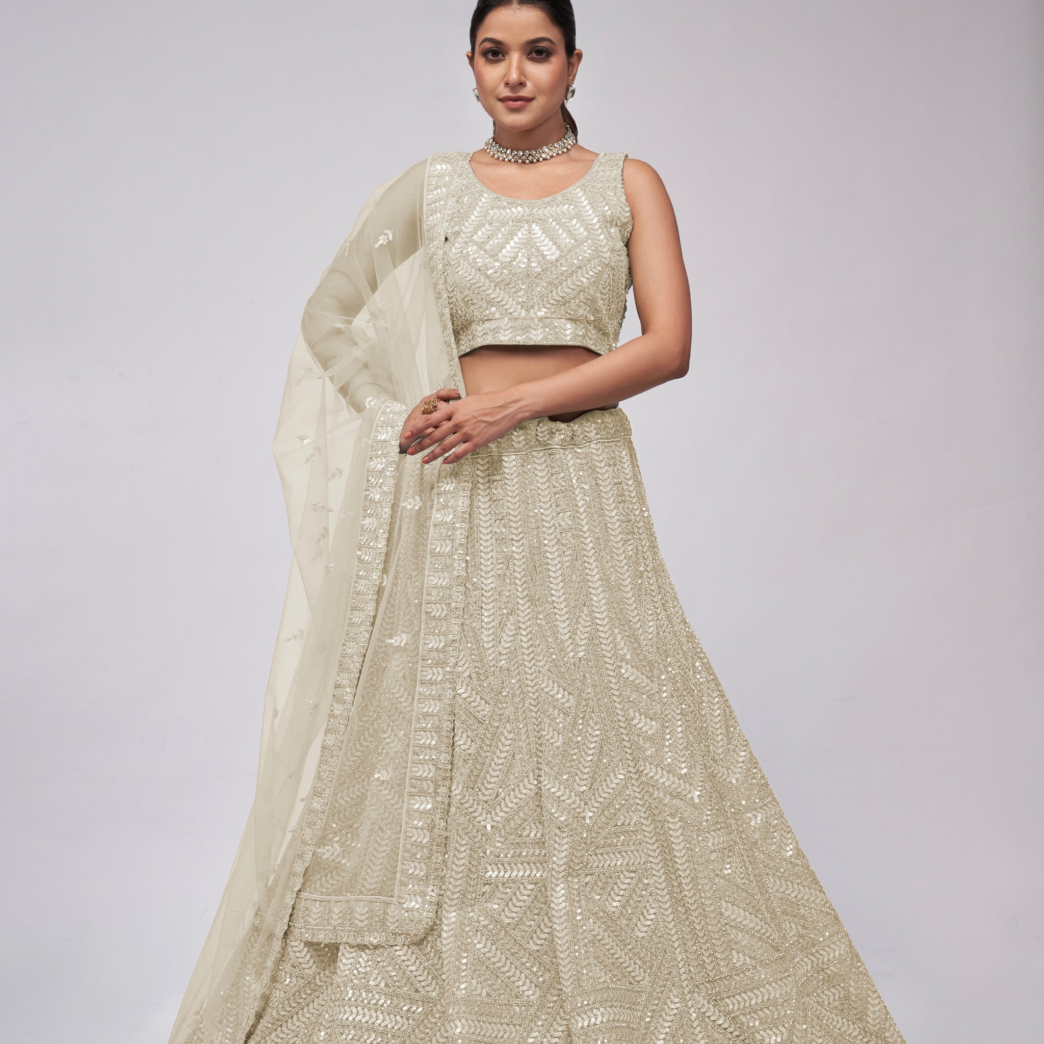 Elegant Ivory Lehenga with Sequins Work and Matching Dupatta