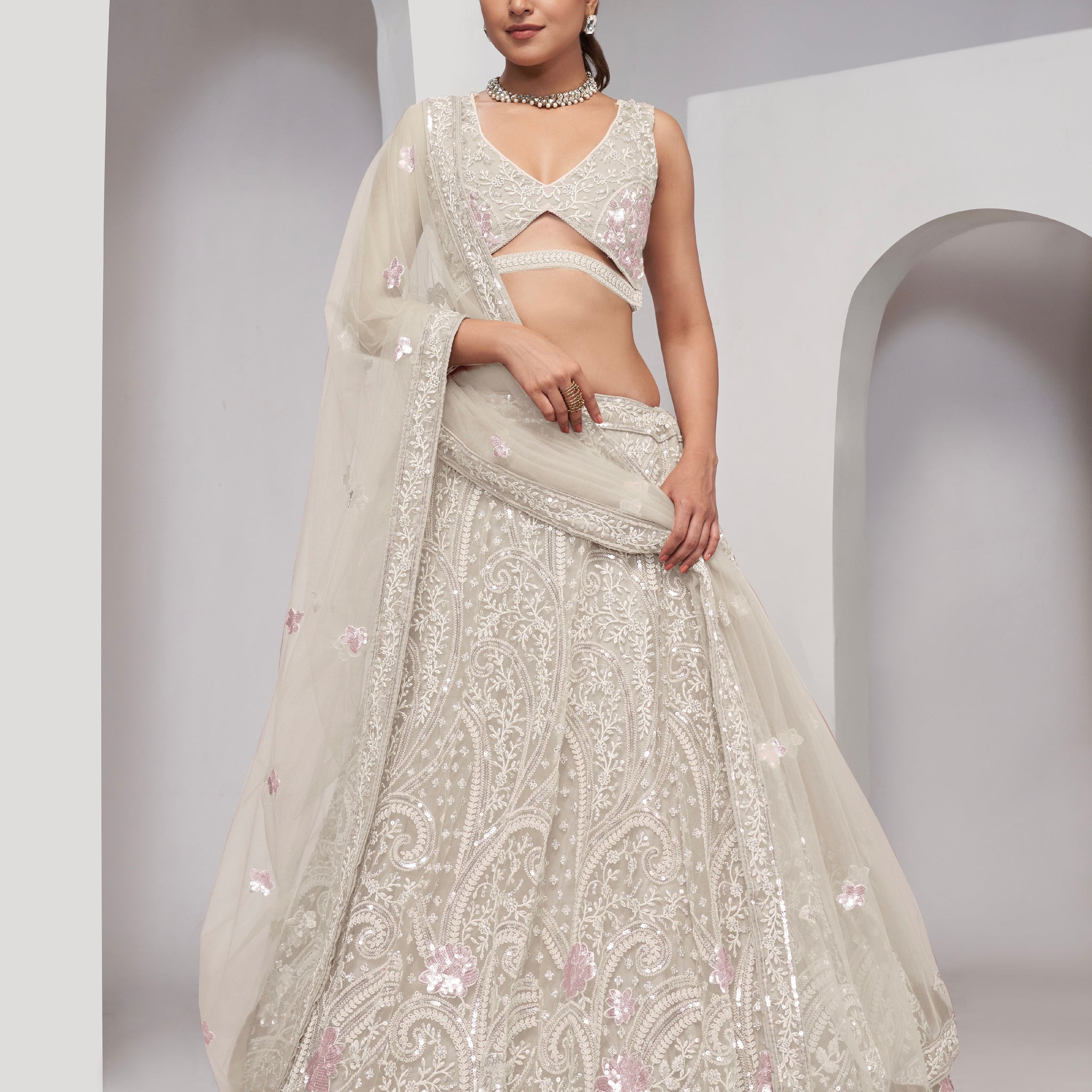 Ivory Paisley Patterned Lehenga with Sequins & Thread Work