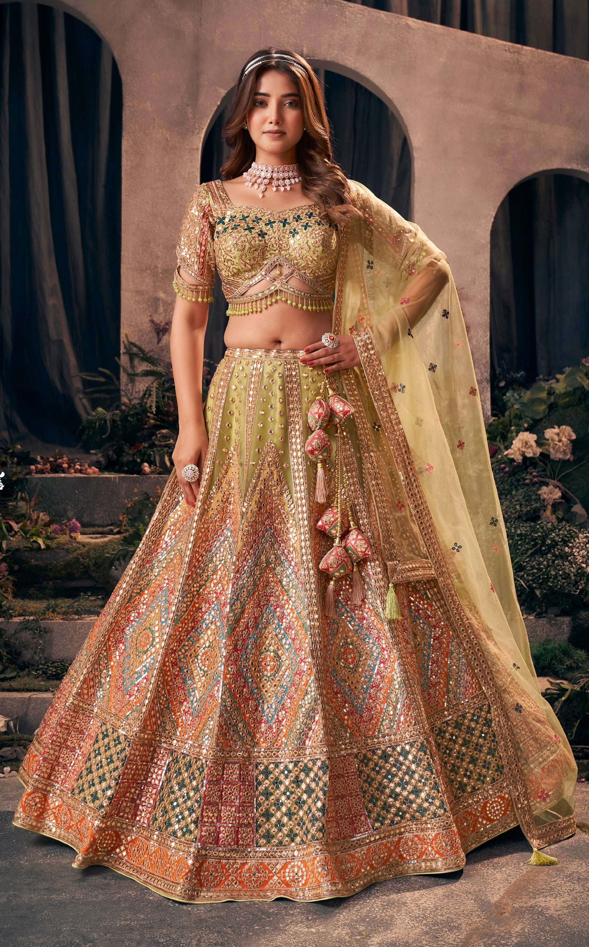 Multicolor designer bridal lehenga with gotapatti and hand work embroidery.