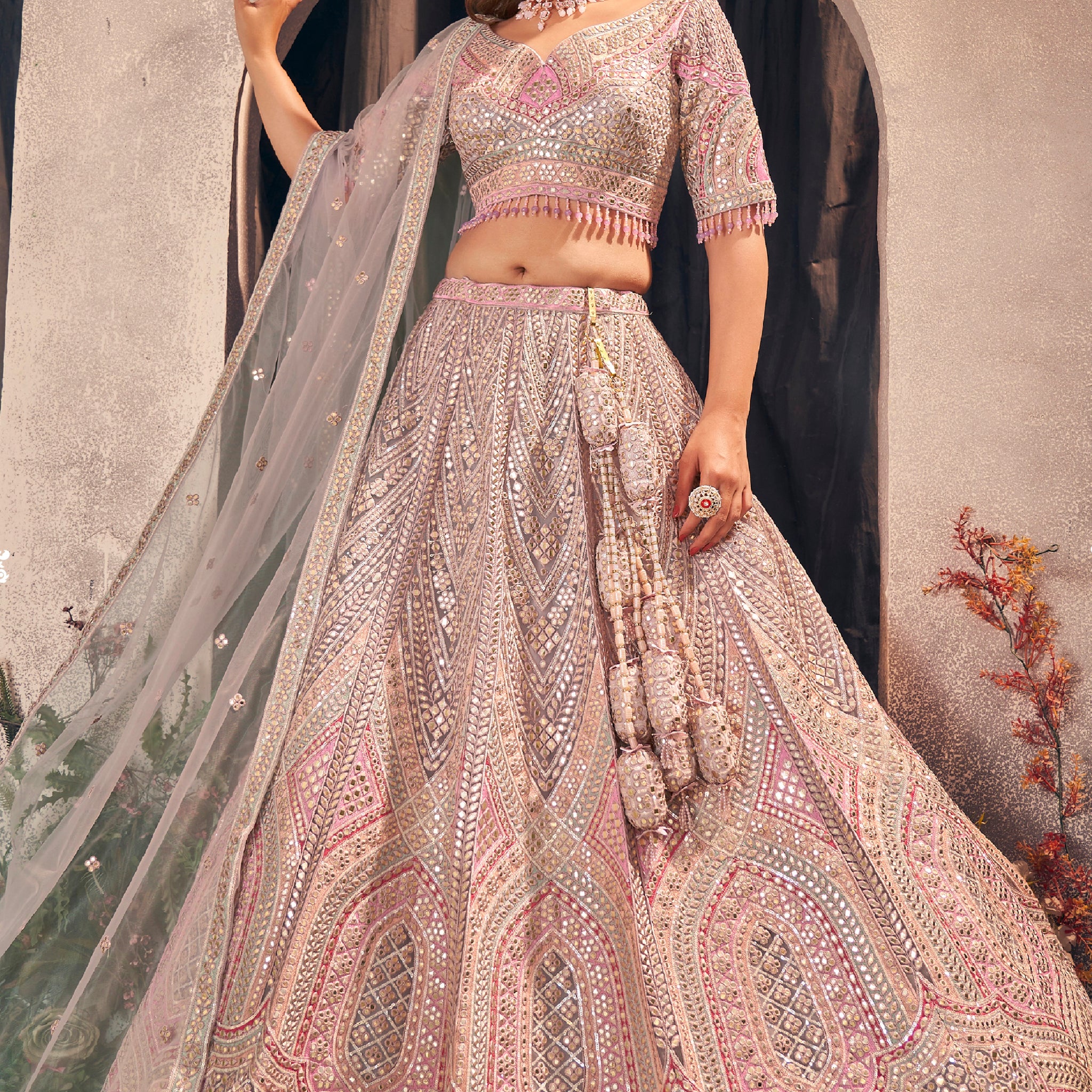 Pink designer bridal lehenga with gotapatti and hand work embroidery.