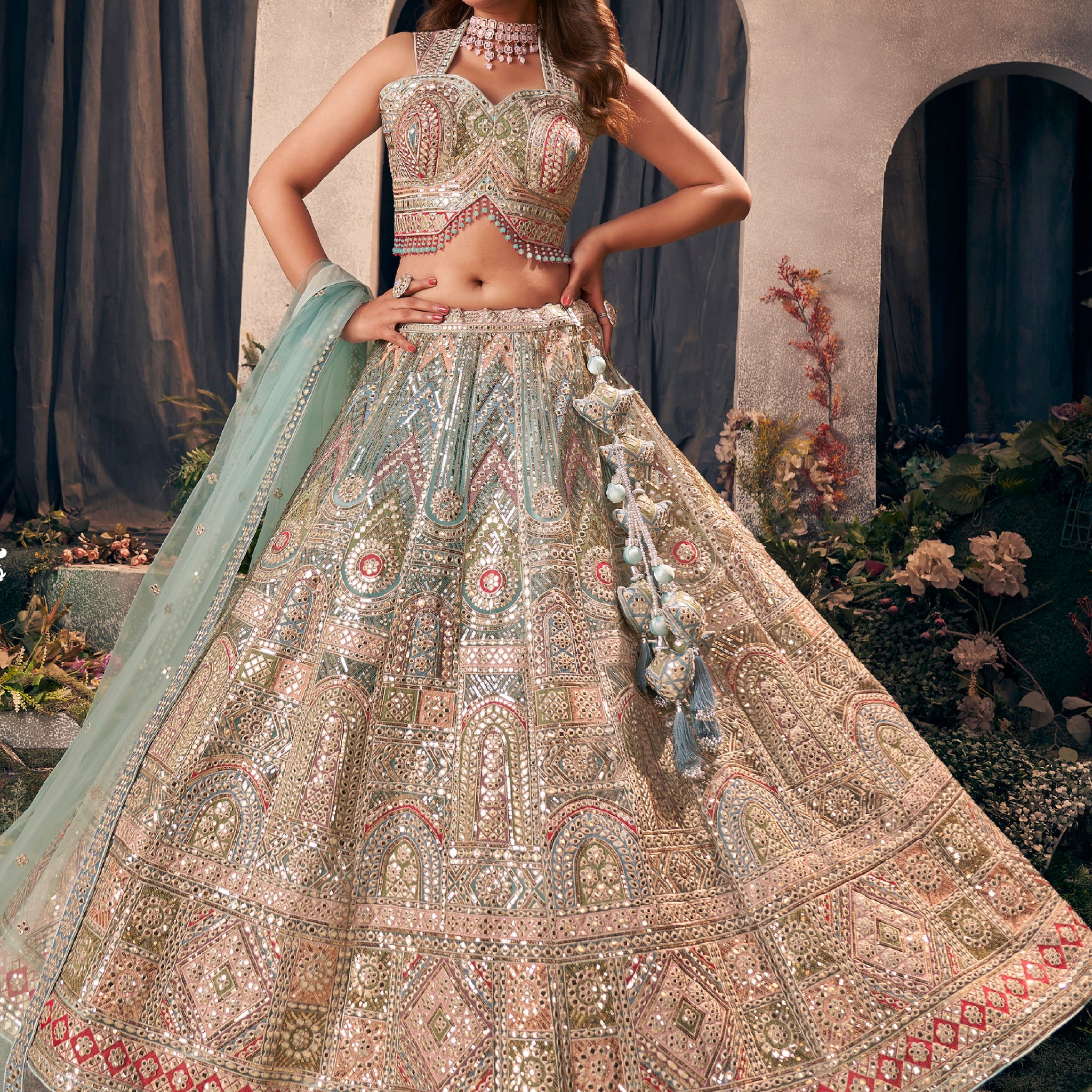 Green designer bridal lehenga with gotapatti and hand work embroidery.