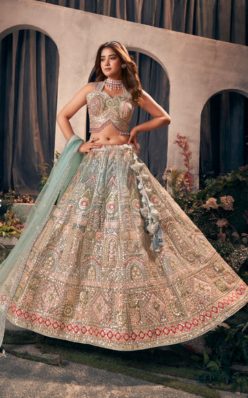 Green designer bridal lehenga with gotapatti and hand work embroidery.