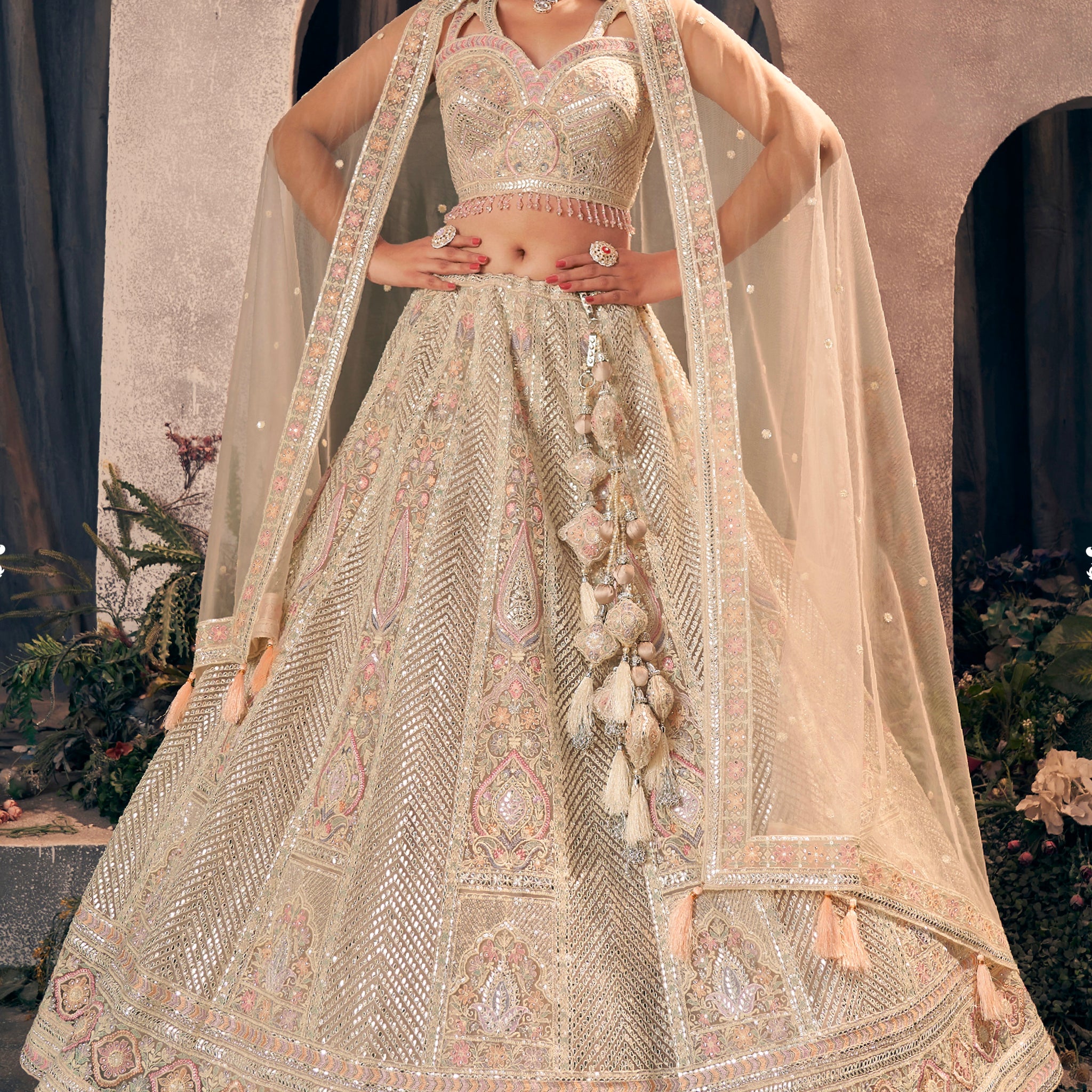 Gold designer bridal lehenga with gotapatti and hand work embroidery.