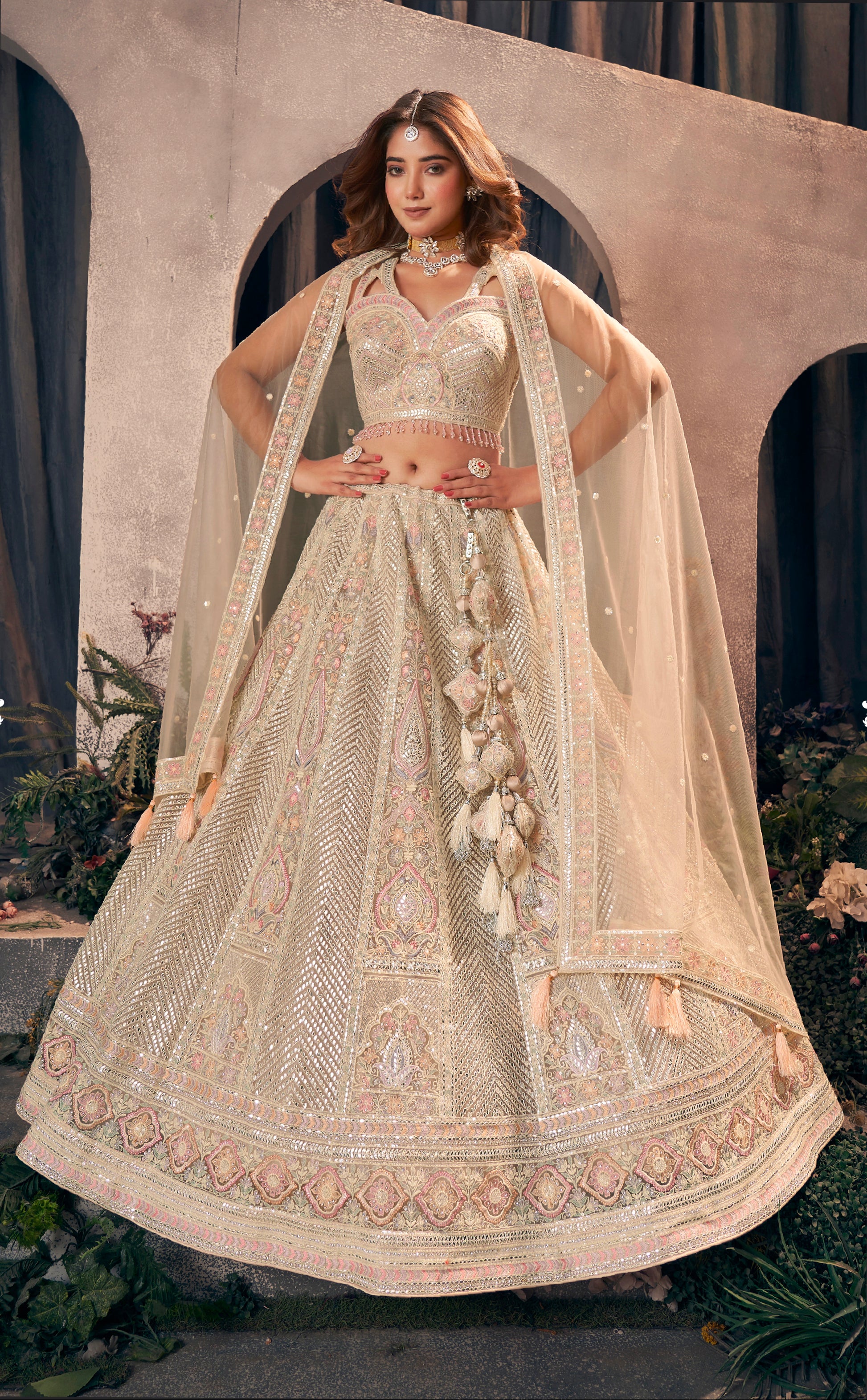 Gold designer bridal lehenga with gotapatti and hand work embroidery.