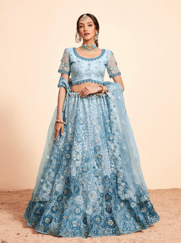 Elegant blue net lehenga with heavy embroidery and zarkan work.