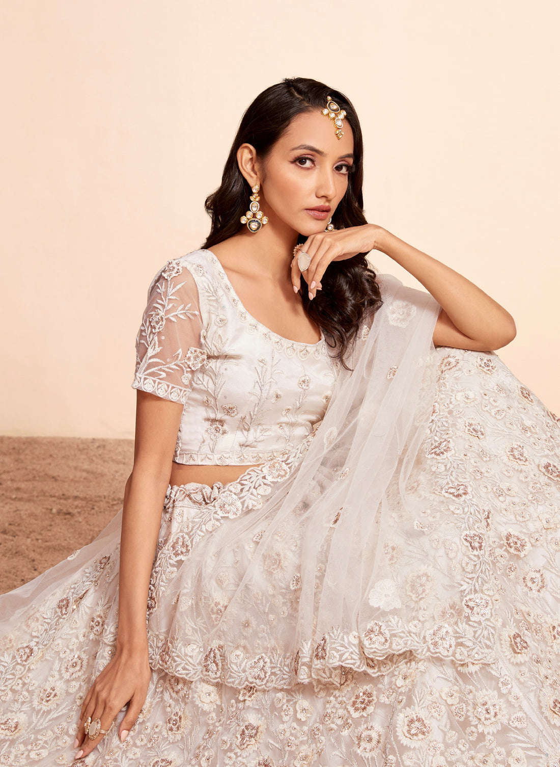 White Net Lehenga Choli Set with Heavy Stone Work Embellishment