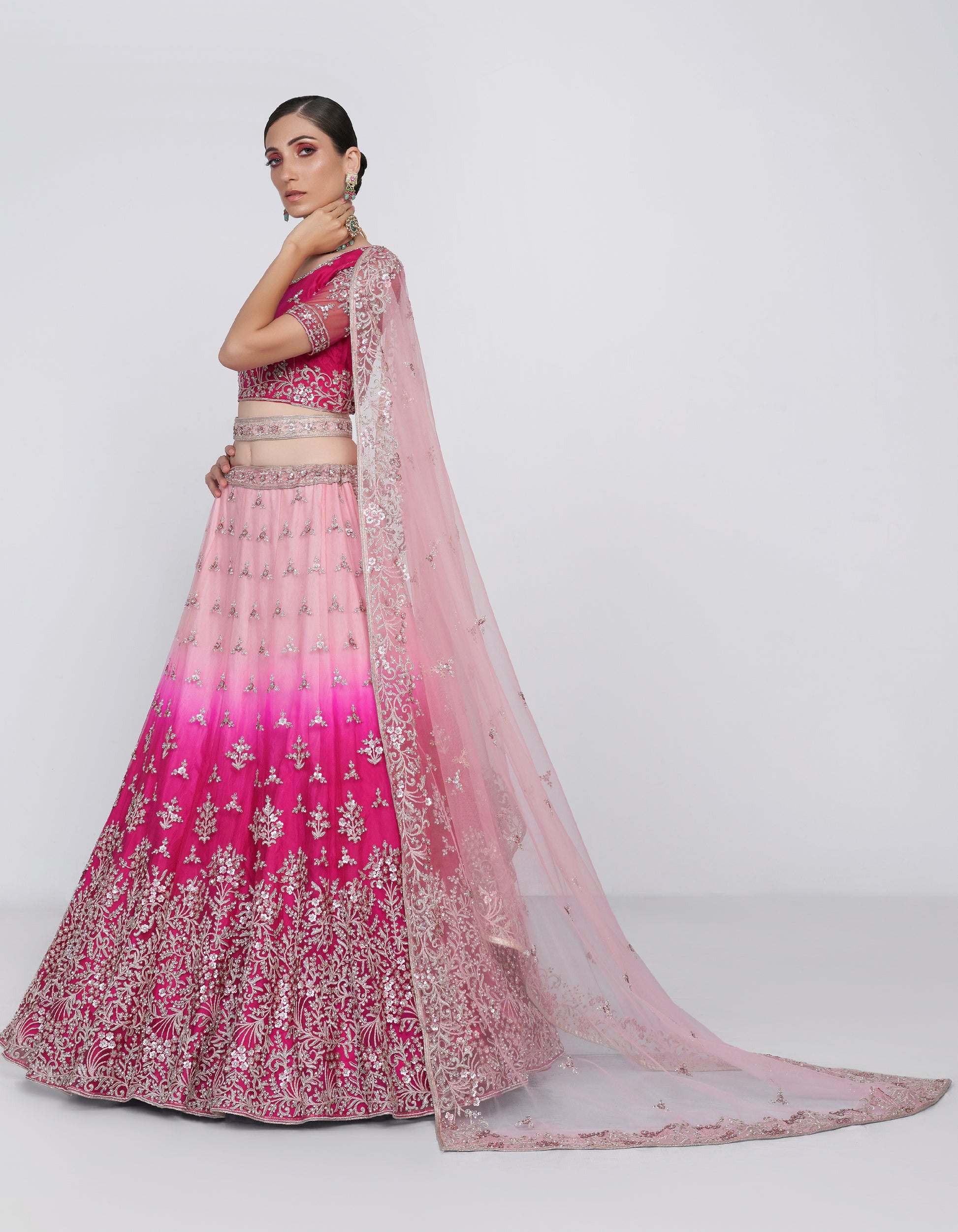 Elegant shaded pink net blouse & lehenga set with silk inner and net dupatta.