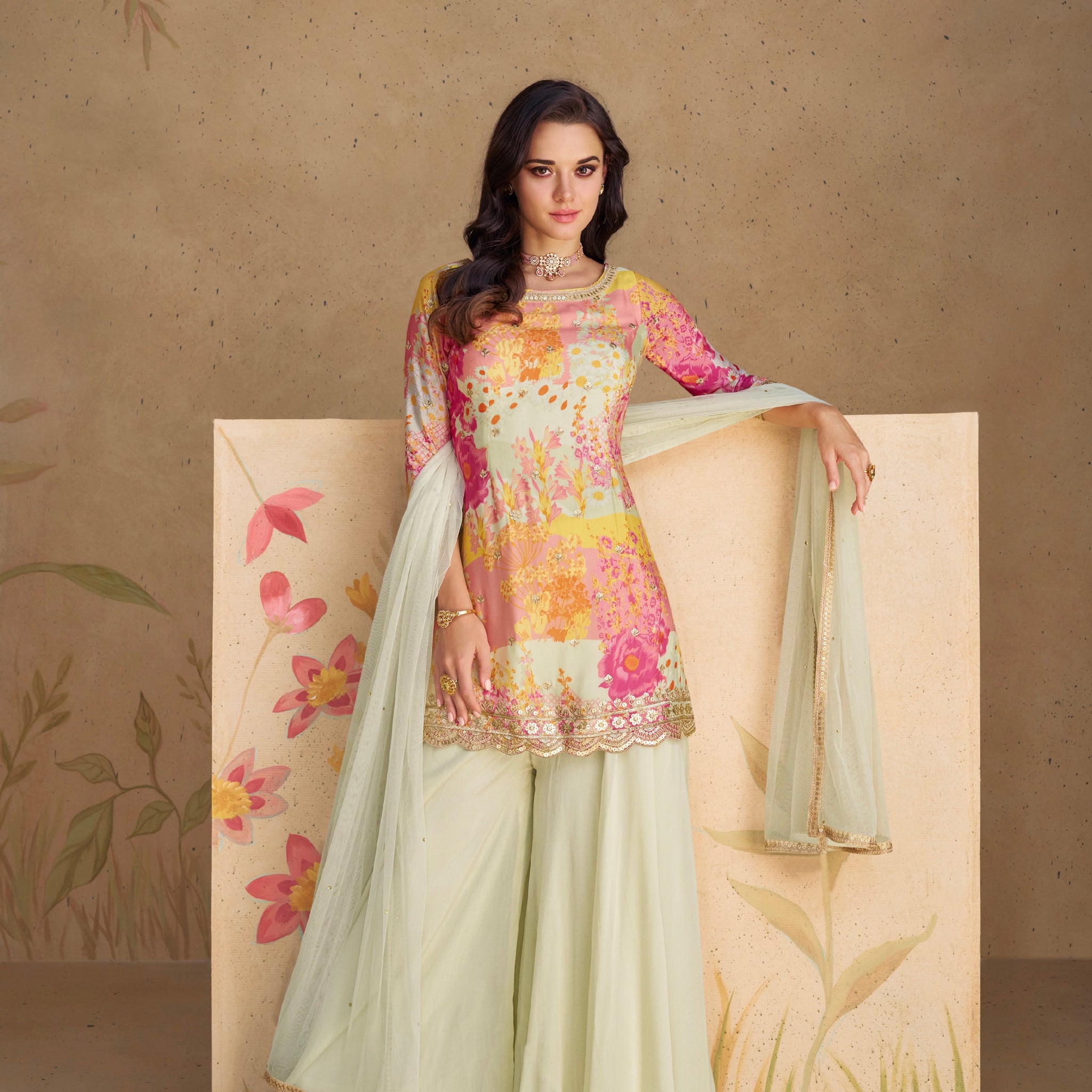 Pastel floral embroidered chinon silk sharara suit with net dupatta