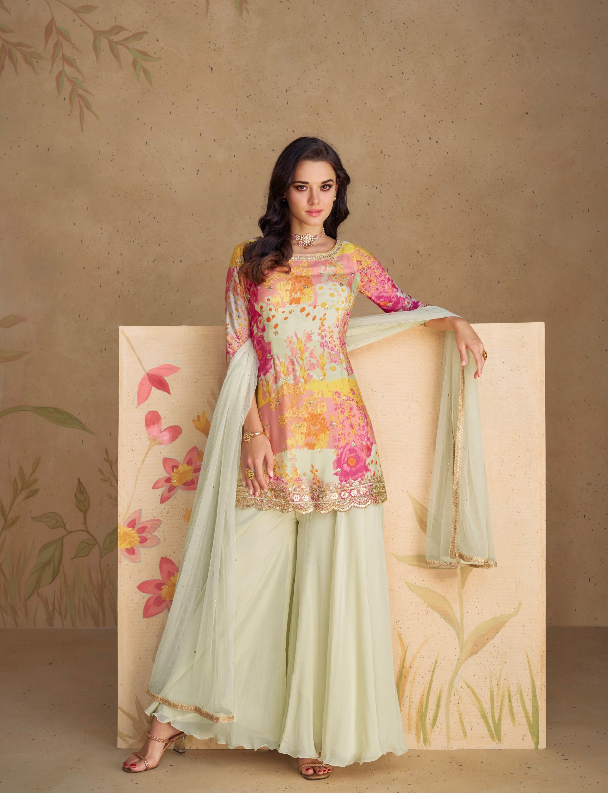 Pastel floral embroidered chinon silk sharara suit with net dupatta