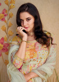 Pastel floral embroidered chinon silk sharara suit with net dupatta