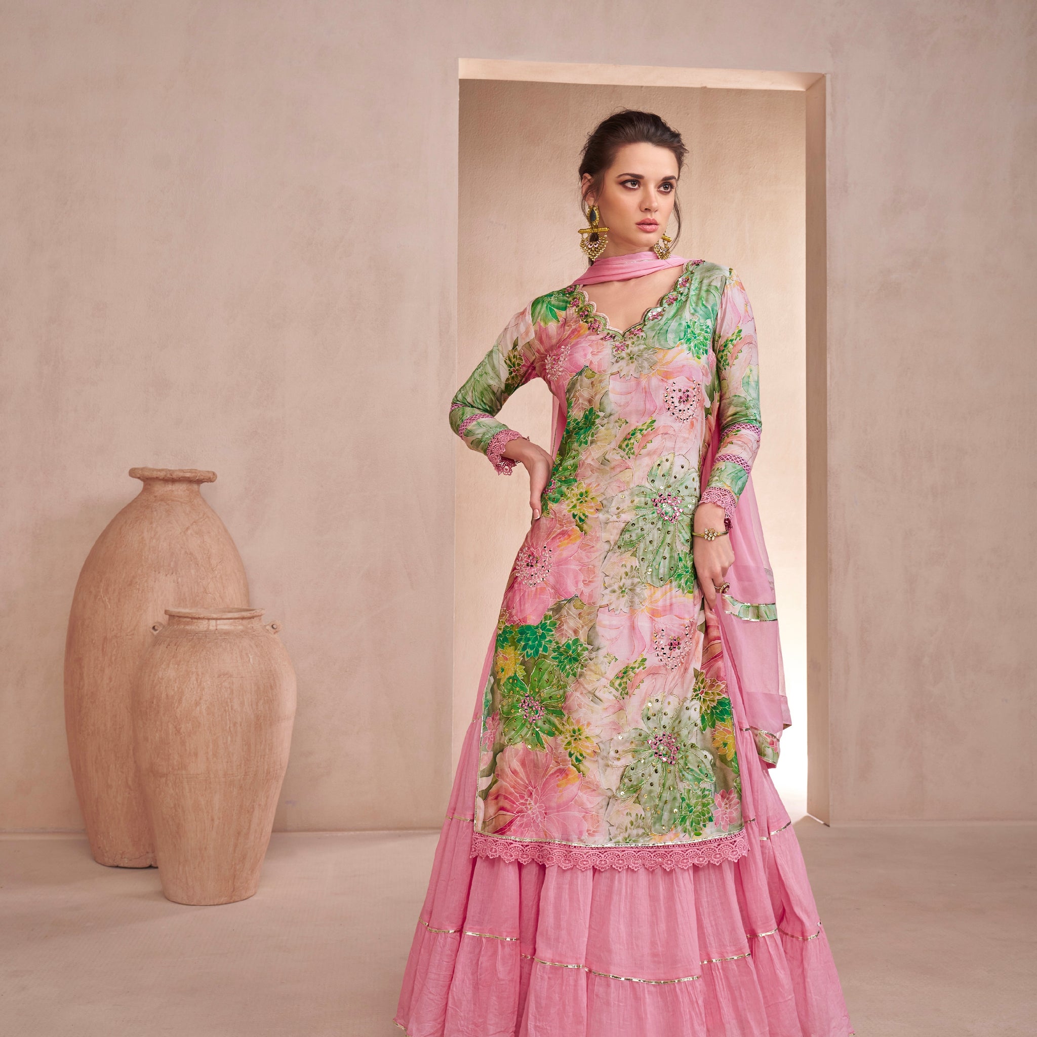 Pink floral Anarkali suit with Nazmeen dupatta.