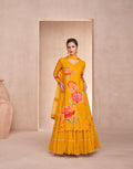 Yellow Muslin Anarkali with hand embellishments and Nazmeen dupatta.