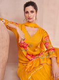 Yellow Muslin Anarkali with hand embellishments and Nazmeen dupatta.