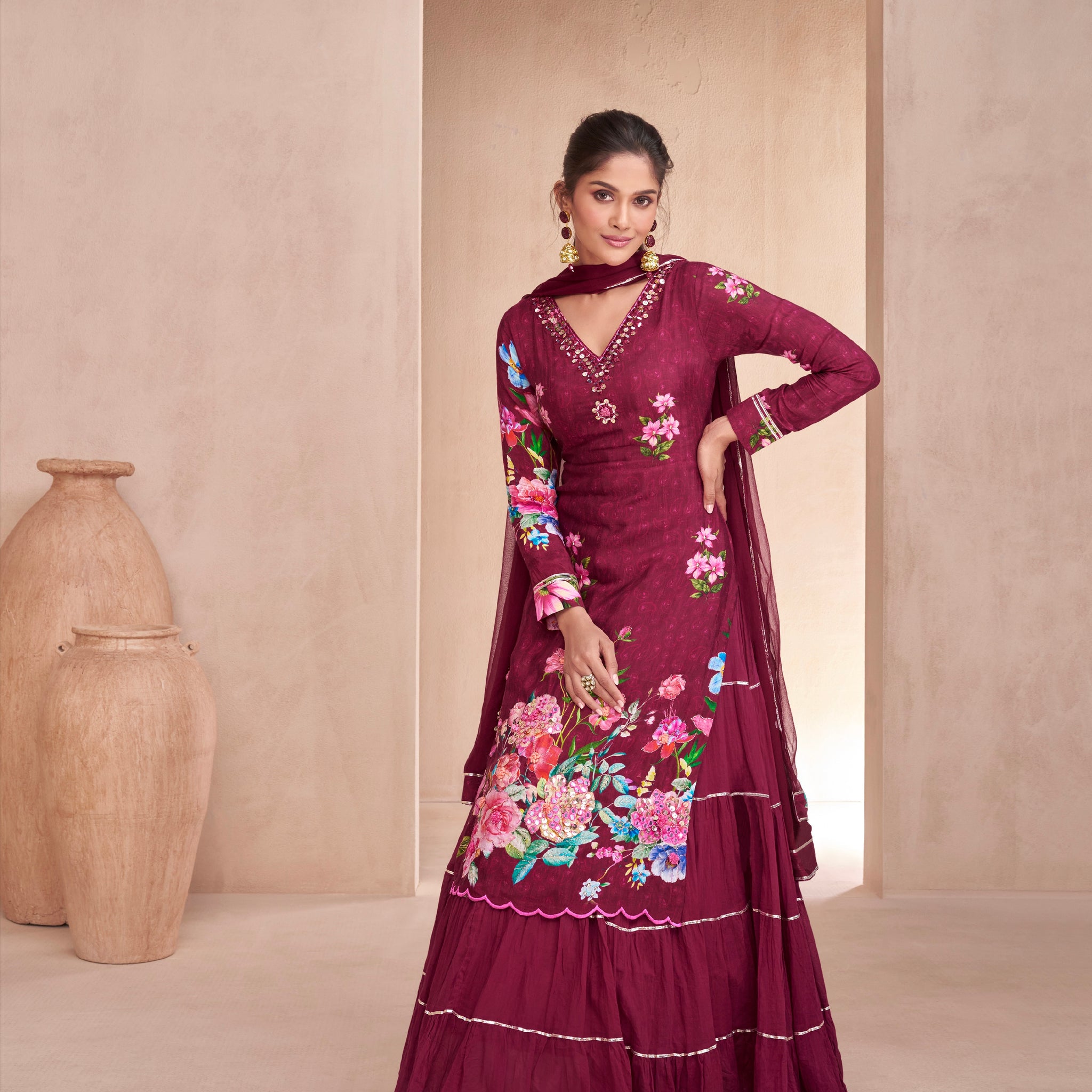 Maroon Muslin Anarkali Suit with hand embellishments.