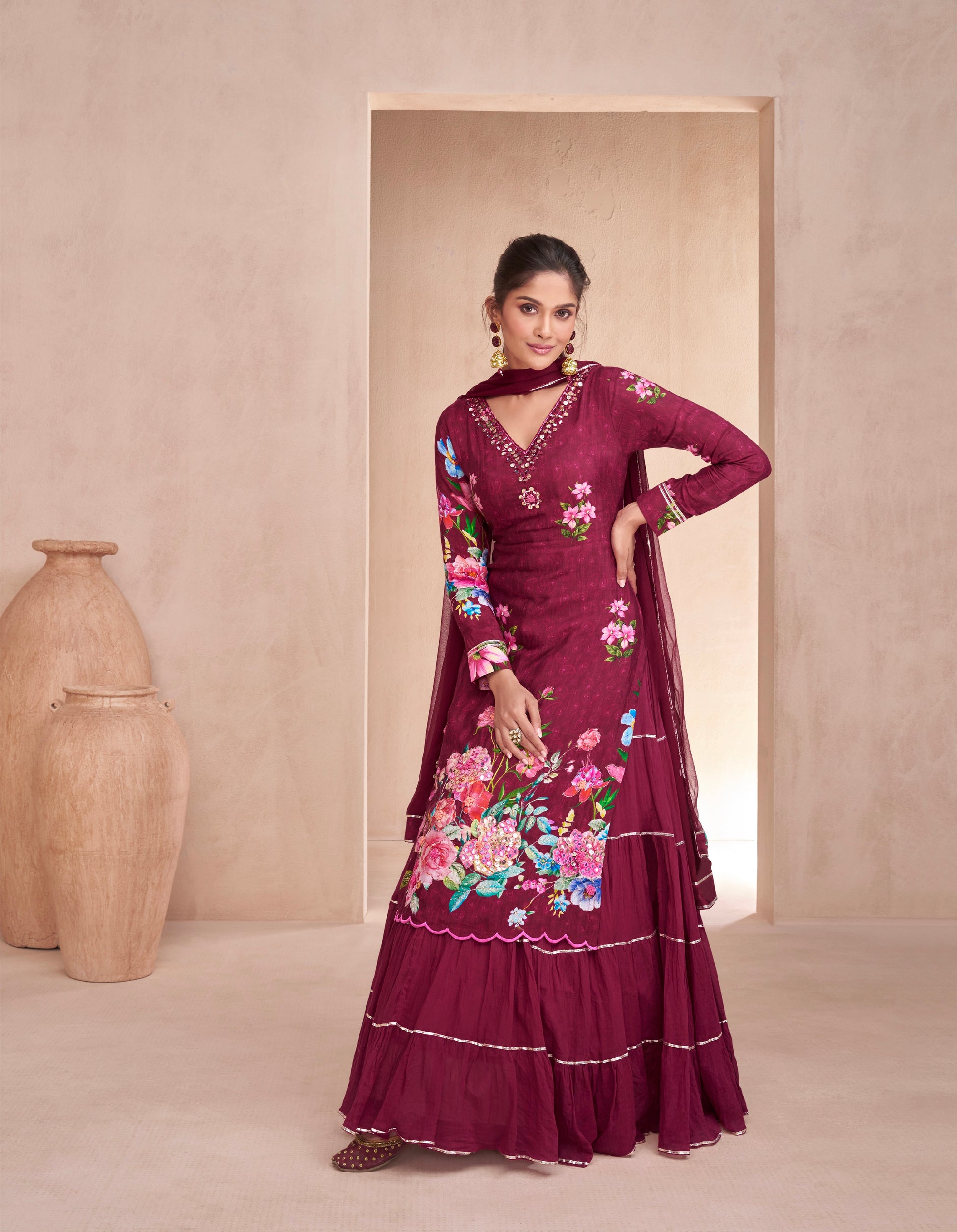 Maroon Muslin Anarkali Suit with hand embellishments.