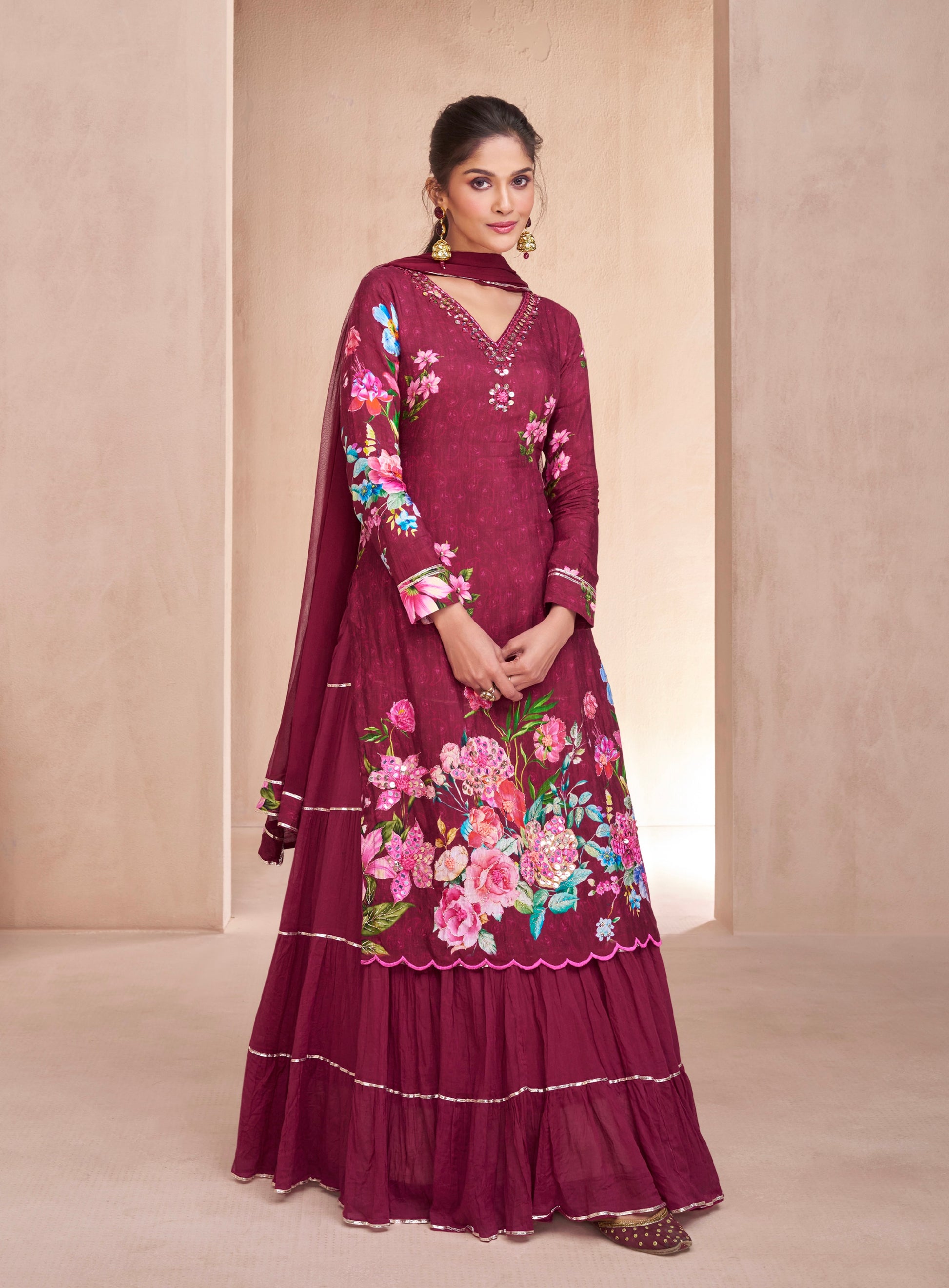 Maroon Muslin Anarkali Suit with hand embellishments.