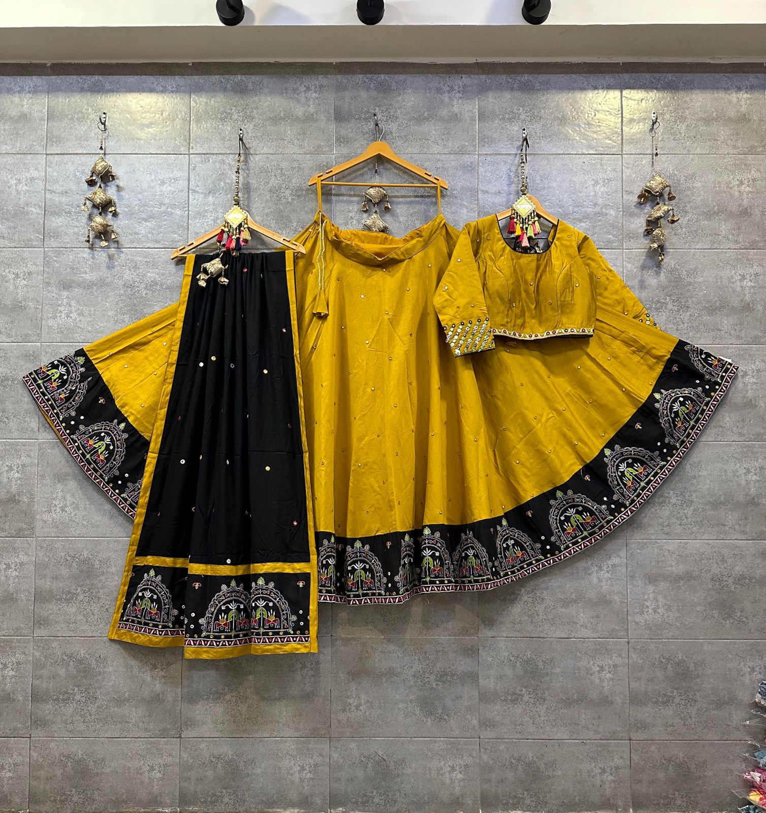 Yellow and Black Cotton Silk Chaniya Choli with Gamthi Thread Work Border and Mirror Work Dupatta