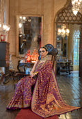 Purple Patola Silk Saree with Traditional Motifs and Handmade Tassels