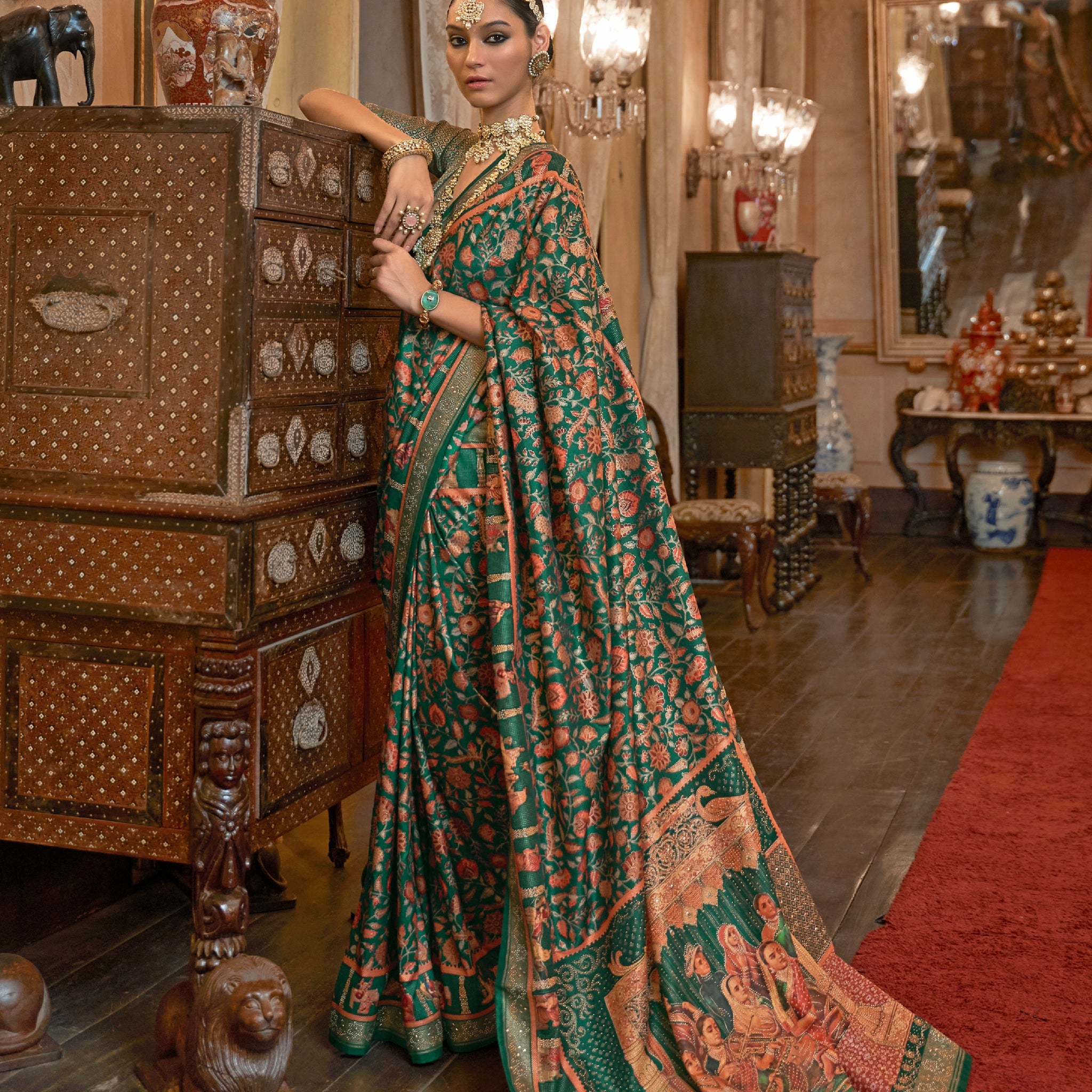 Green Patola Silk Saree with Traditional Motifs and Handmade Tassels