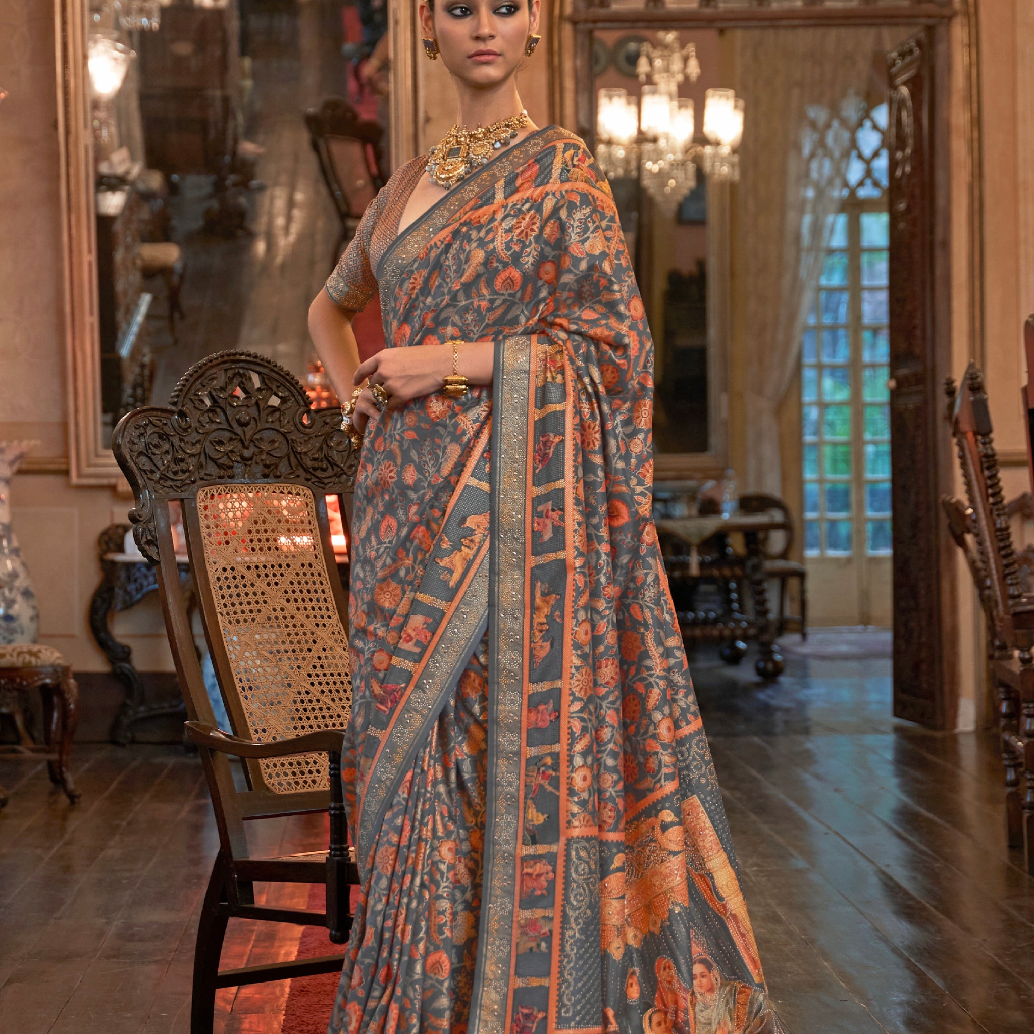 Grey Patola Silk Saree with Traditional Motifs and Handmade Tassels