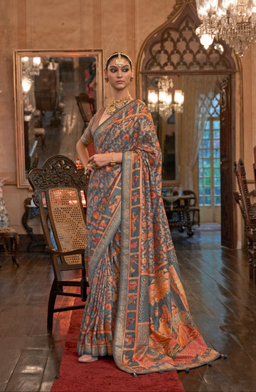 Grey Patola Silk Saree with Traditional Motifs and Handmade Tassels