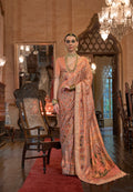 Peach Patola Silk Saree with Traditional Motifs and Handmade Tassels