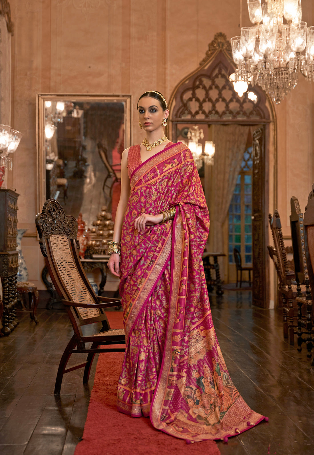 Pink Patola Silk Saree with Traditional Motifs and Handmade Tassels