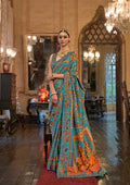 Turquoise Patola Silk Saree with Traditional Motifs and Handmade Tassels