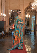 Turquoise Patola Silk Saree with Traditional Motifs and Handmade Tassels