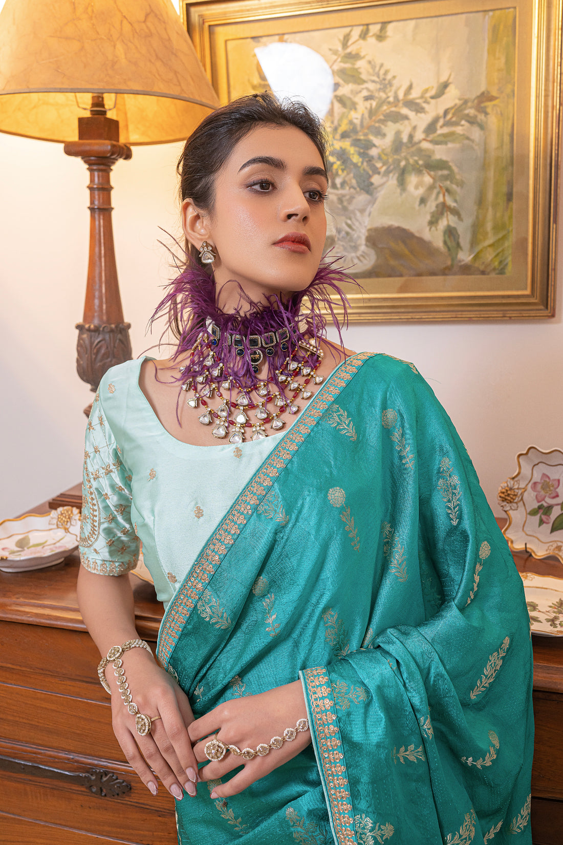 Turquoise Viscose Satin Silk Saree with Zari Motifs and Sequin Embroidery