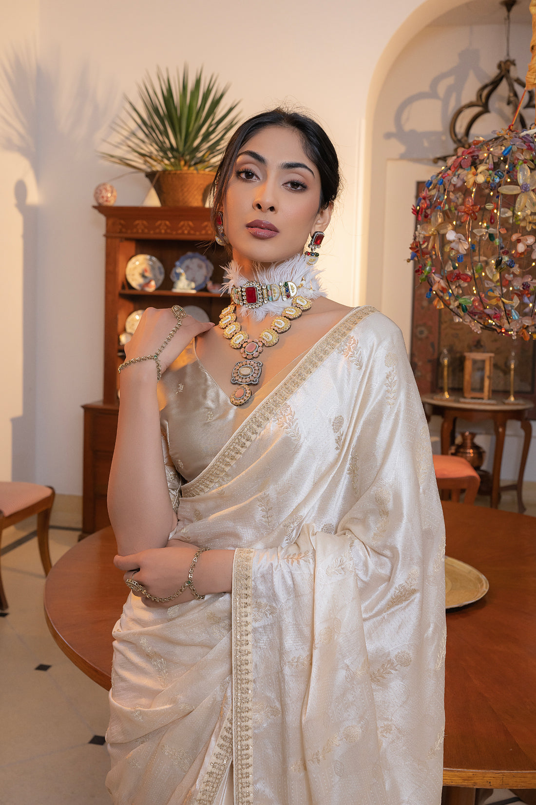 White Viscose Satin Silk Saree with Zari Motifs and Sequin Embroidery