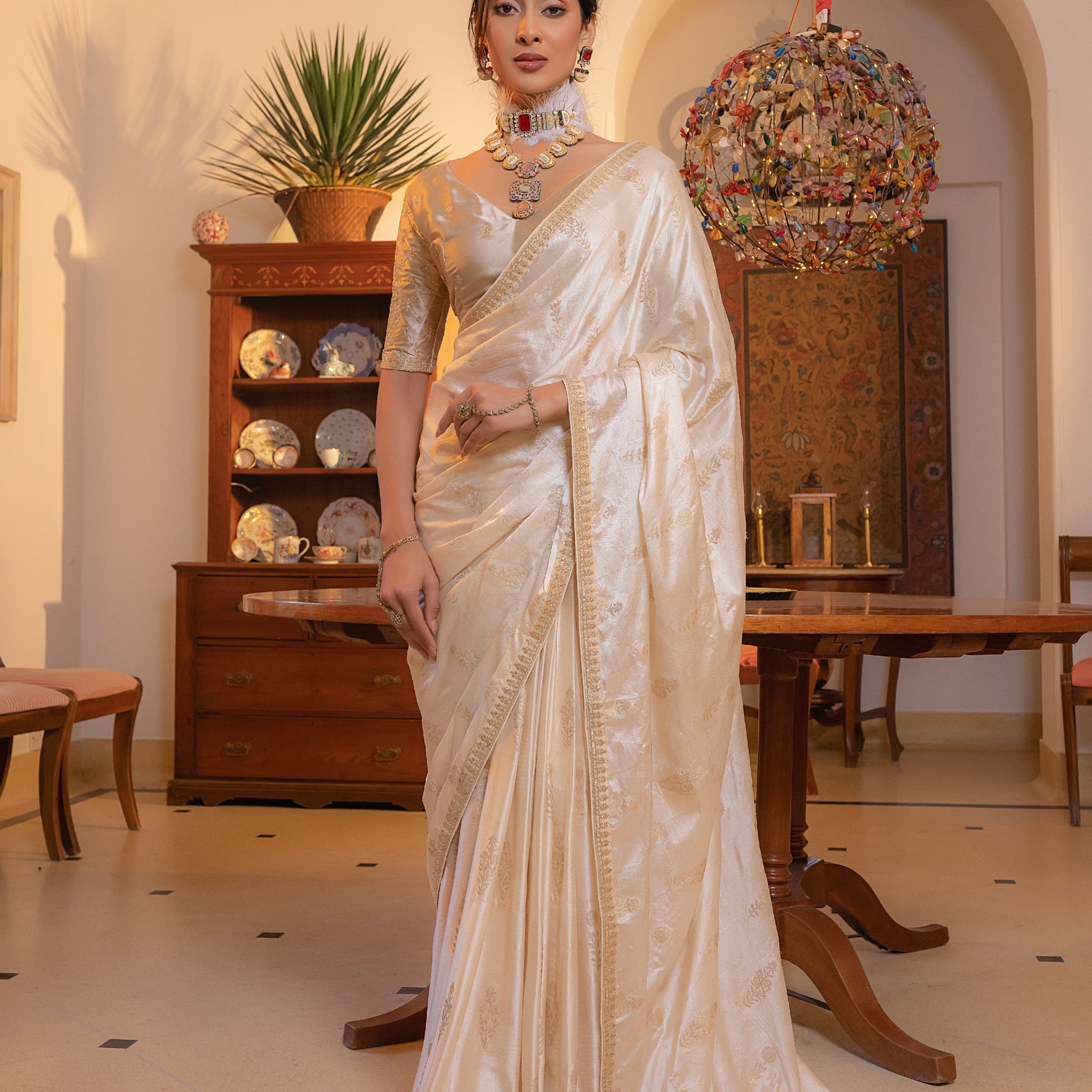 White Viscose Satin Silk Saree with Zari Motifs and Sequin Embroidery