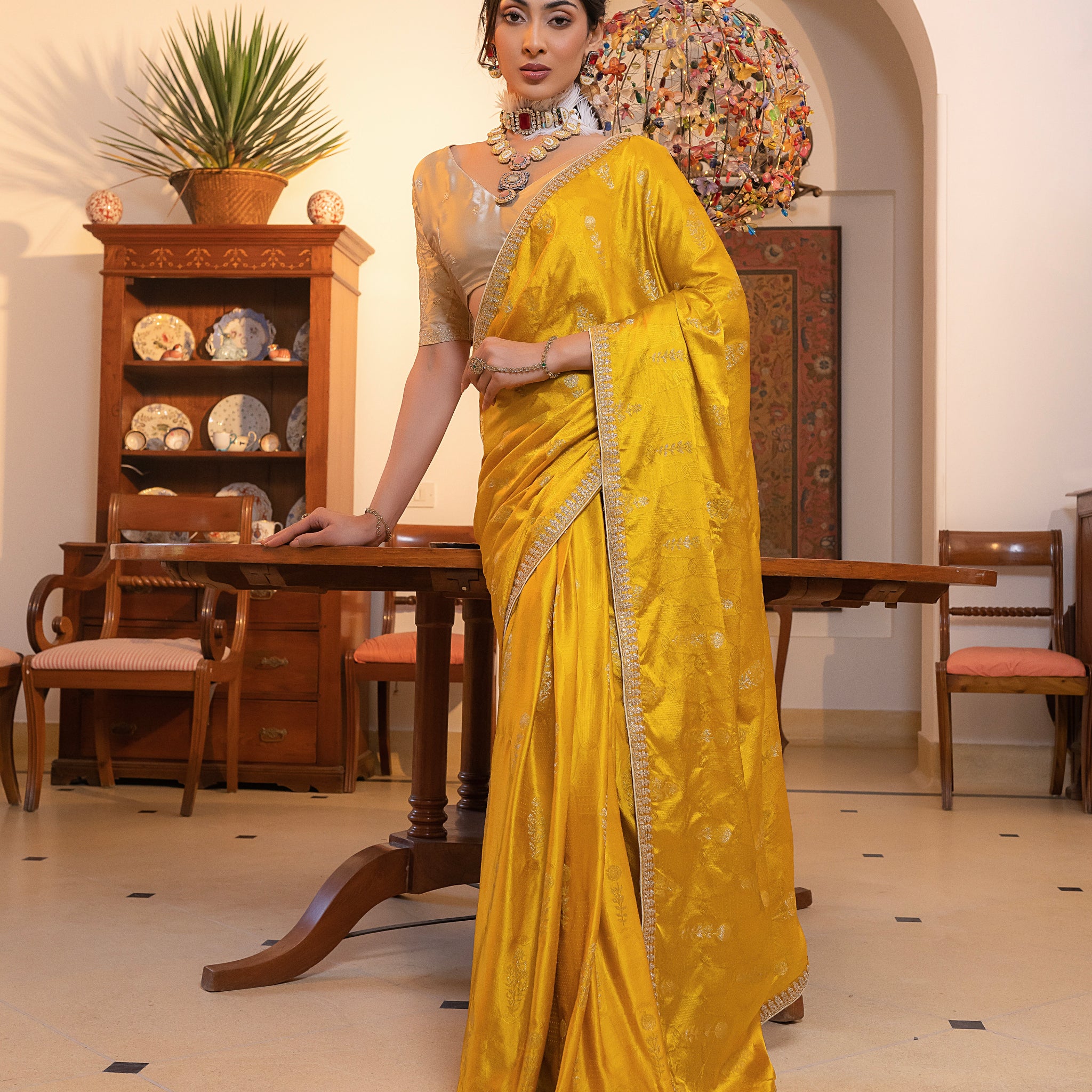 Yellow Viscose Satin Silk Saree with Zari Motifs and Sequin Embroidery