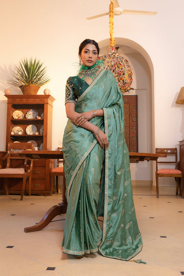 Sea Green Viscose Satin Silk Saree with Zari Motifs and Sequin Embroidery