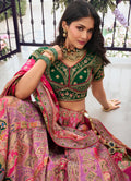 Pink and Green Banarasi Silk Wedding Lehenga with Zarkan Work