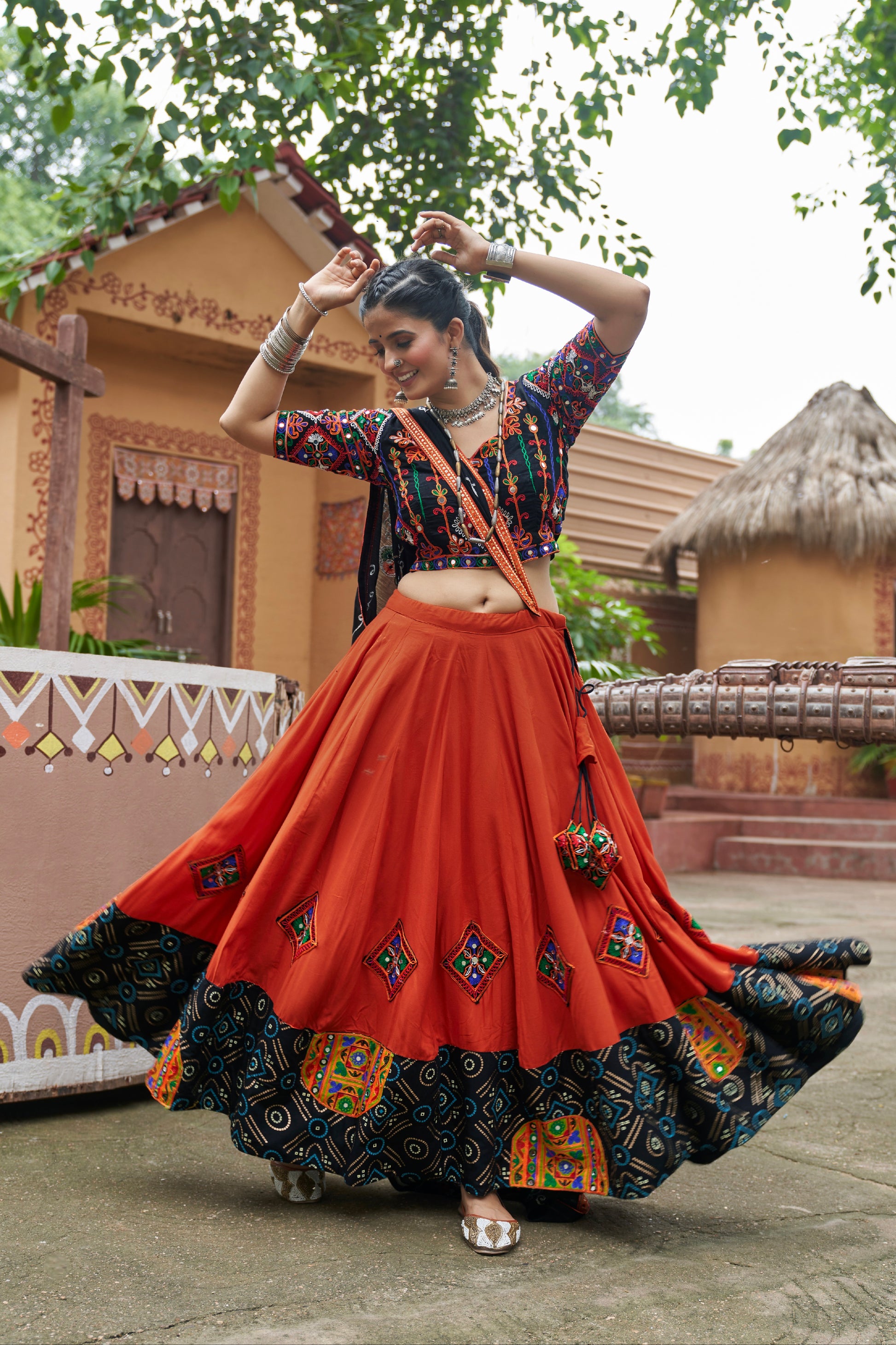 Orange Mirror Work Chaniya Choli with Viscose Rayon Dupatta for Navratri