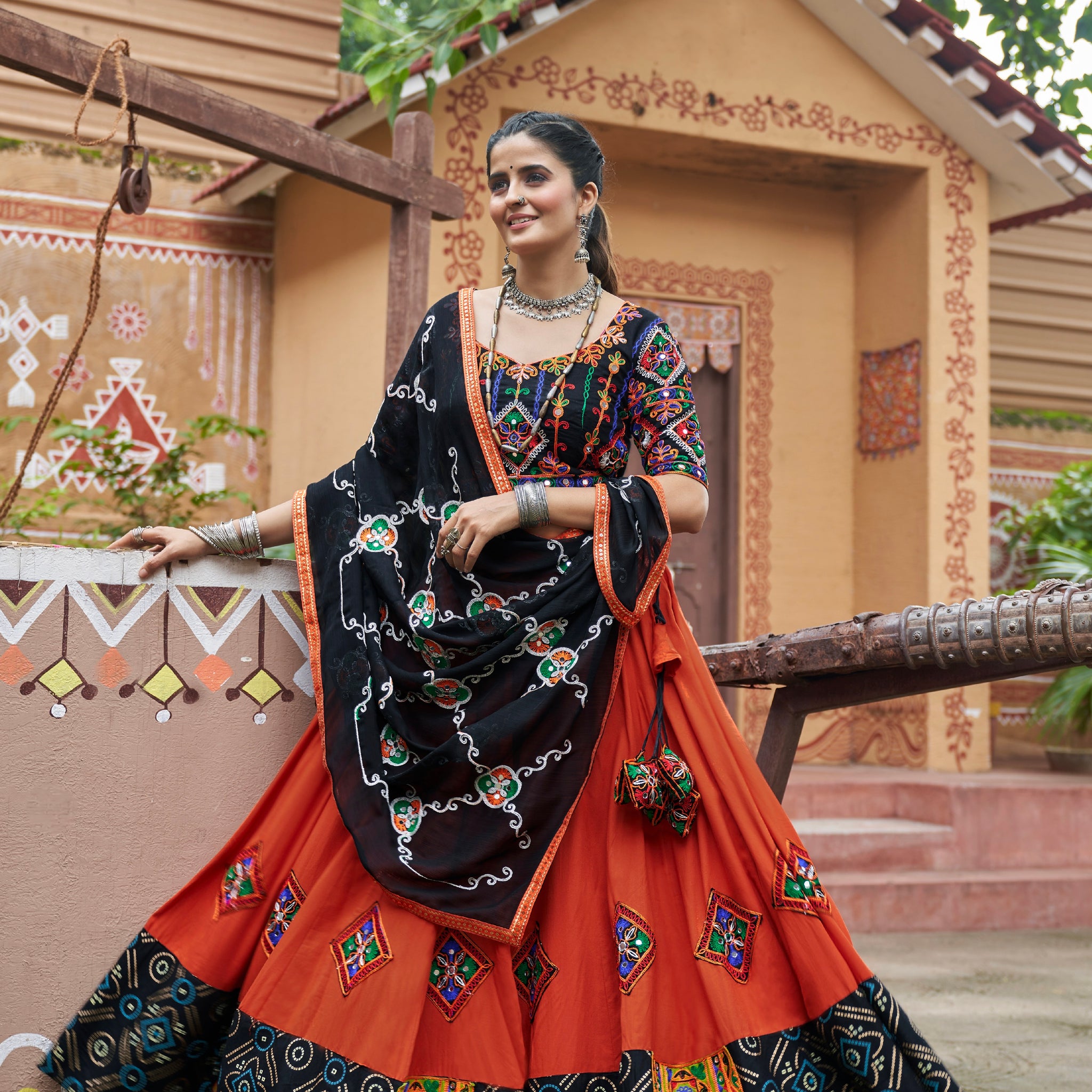 Orange Mirror Work Chaniya Choli with Viscose Rayon Dupatta for Navratri