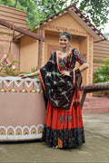 Orange Mirror Work Chaniya Choli with Viscose Rayon Dupatta for Navratri