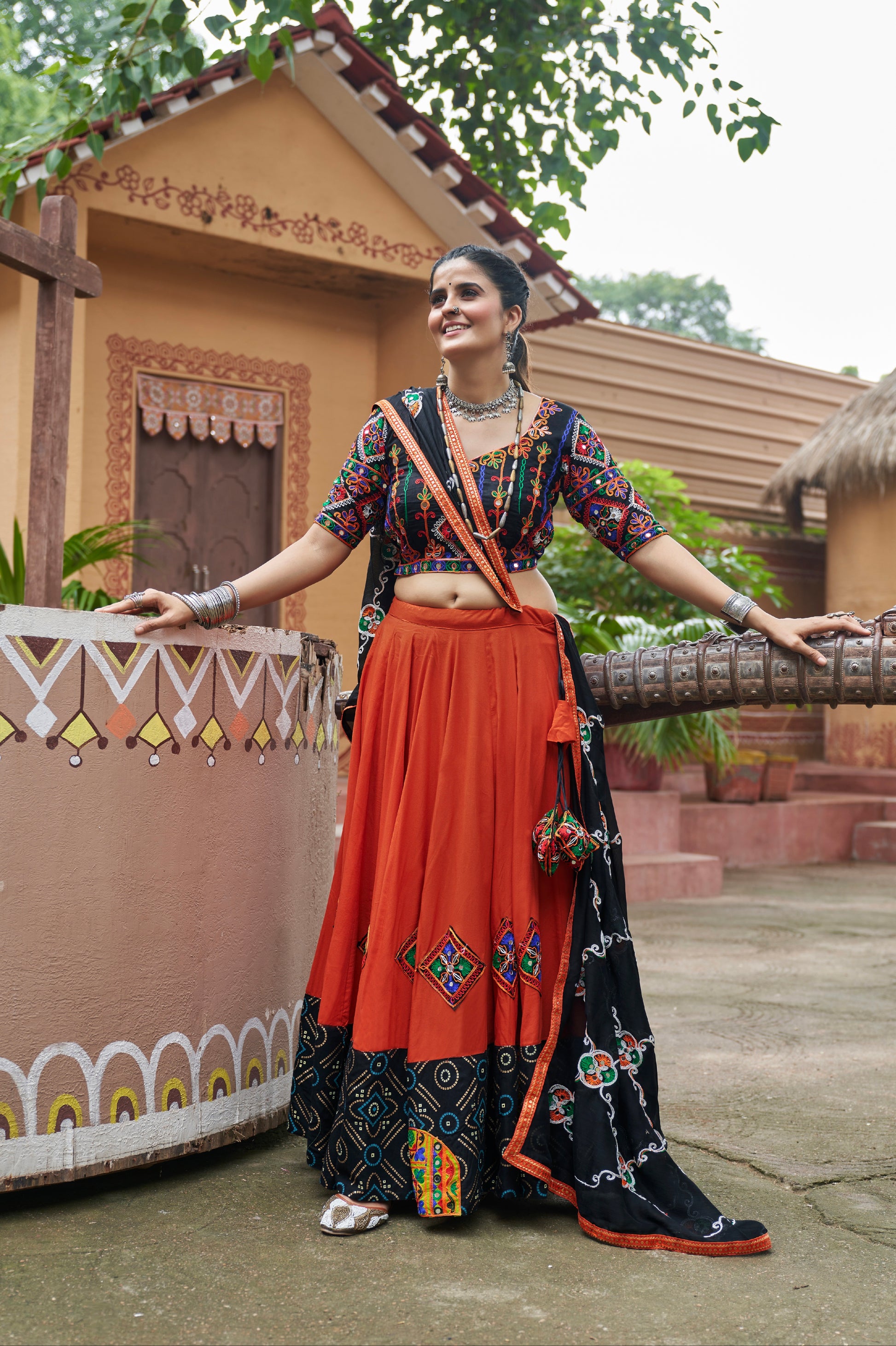 Orange Mirror Work Chaniya Choli with Viscose Rayon Dupatta for Navratri