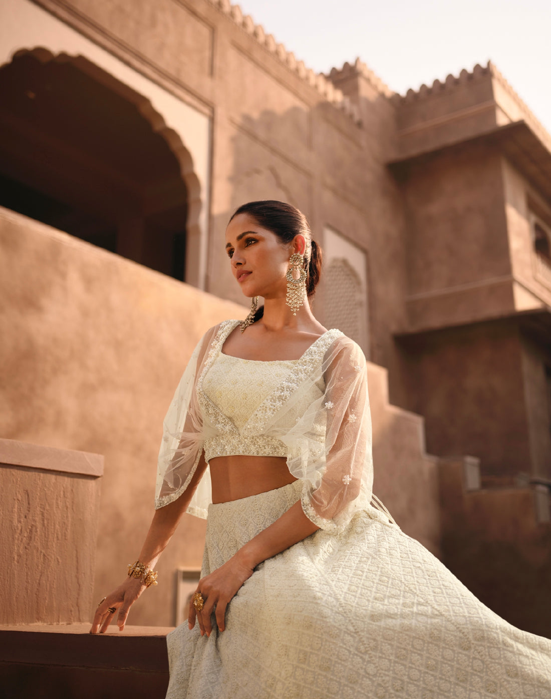 Off-White Embroidered Crop Top and Skirt Lehenga Set